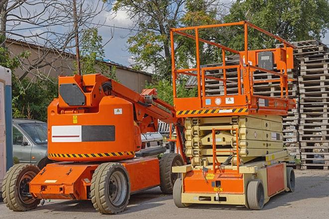 heavy-duty forklift maneuvering through a busy warehouse in Exeter